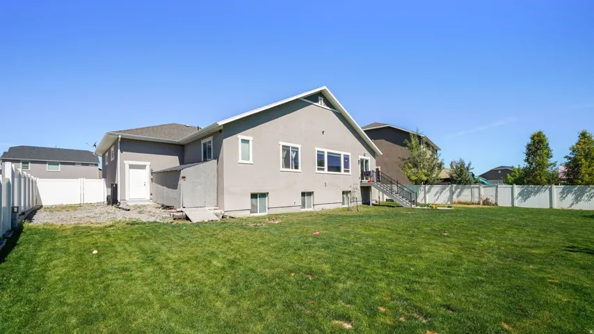 Expansive green lawn providing ample outdoor space