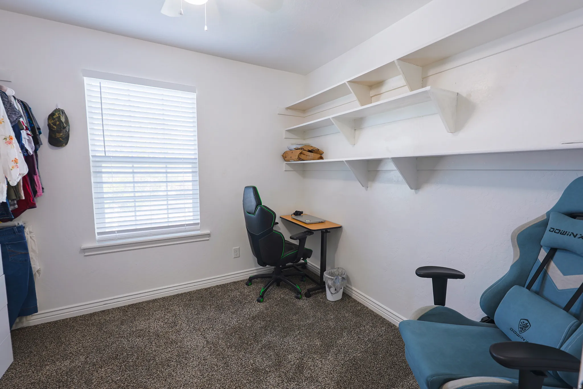 Large Walk-in Closet seamless flow from Primary Bathroom.