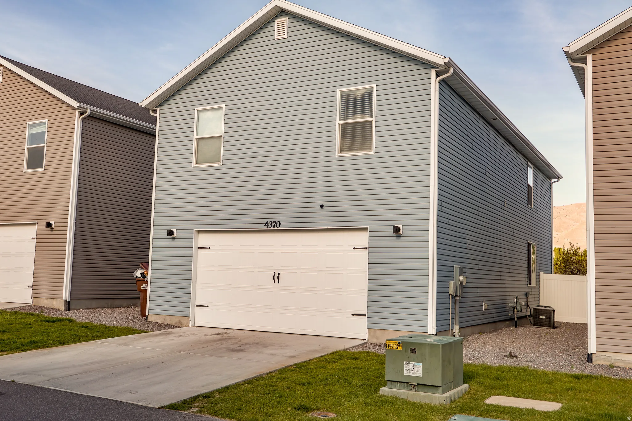 Back of house. Easy access to extra wide Garage.