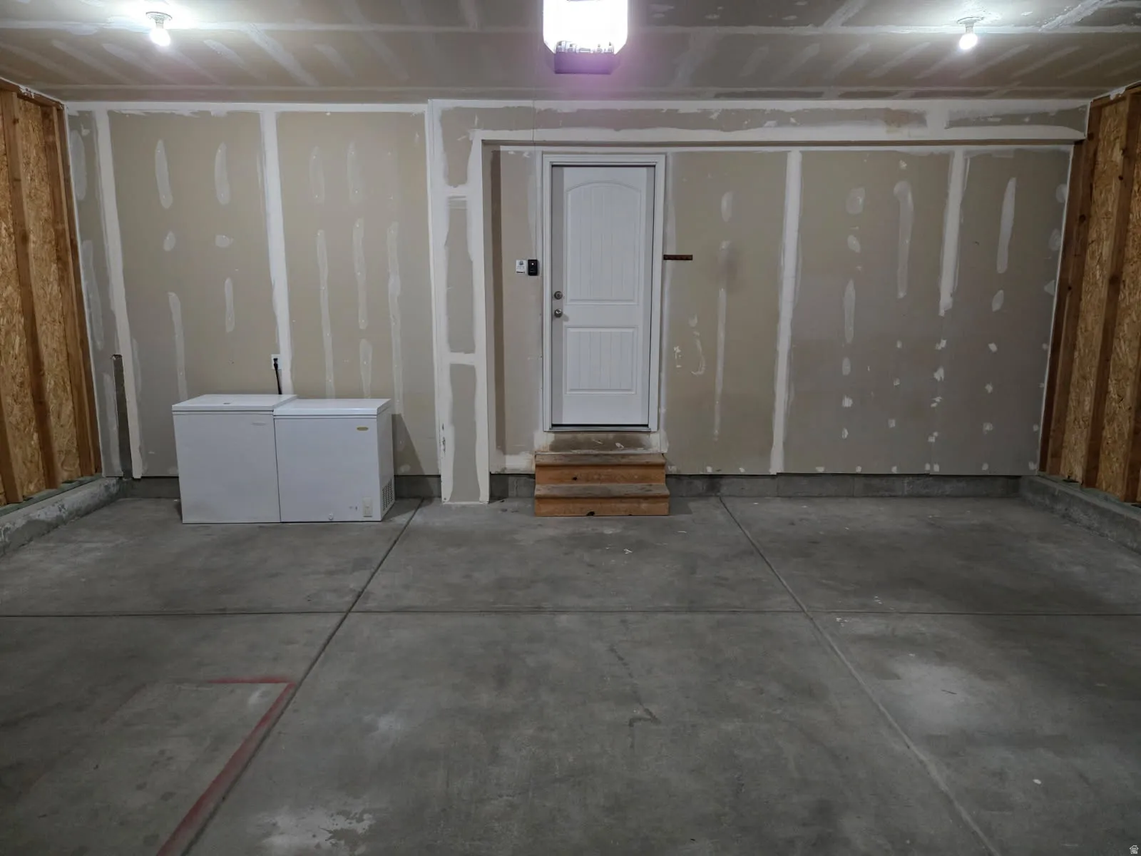 Spacious garage with a concrete floor