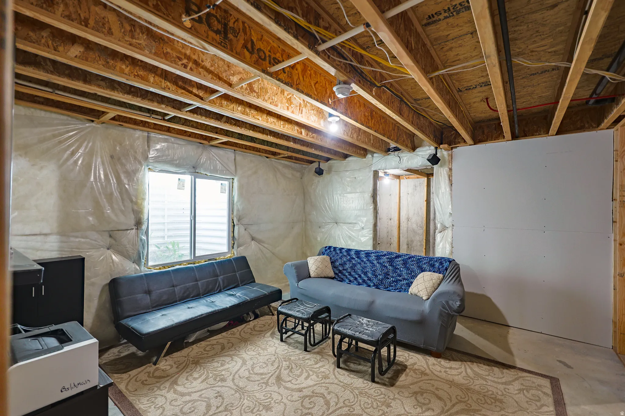 Unfinished basement. Room for another family room.