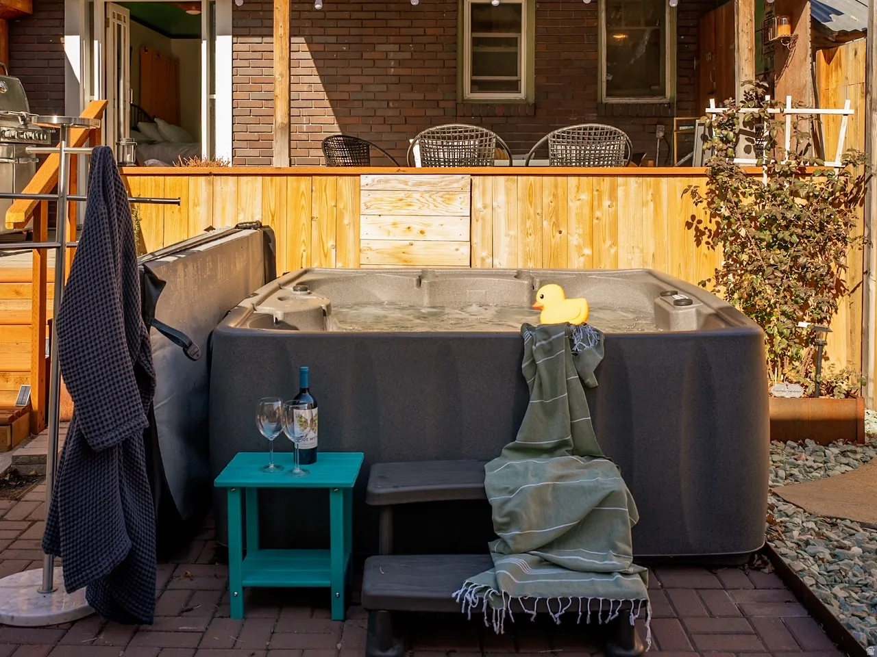 An inviting hot tub is included for your private oasis!