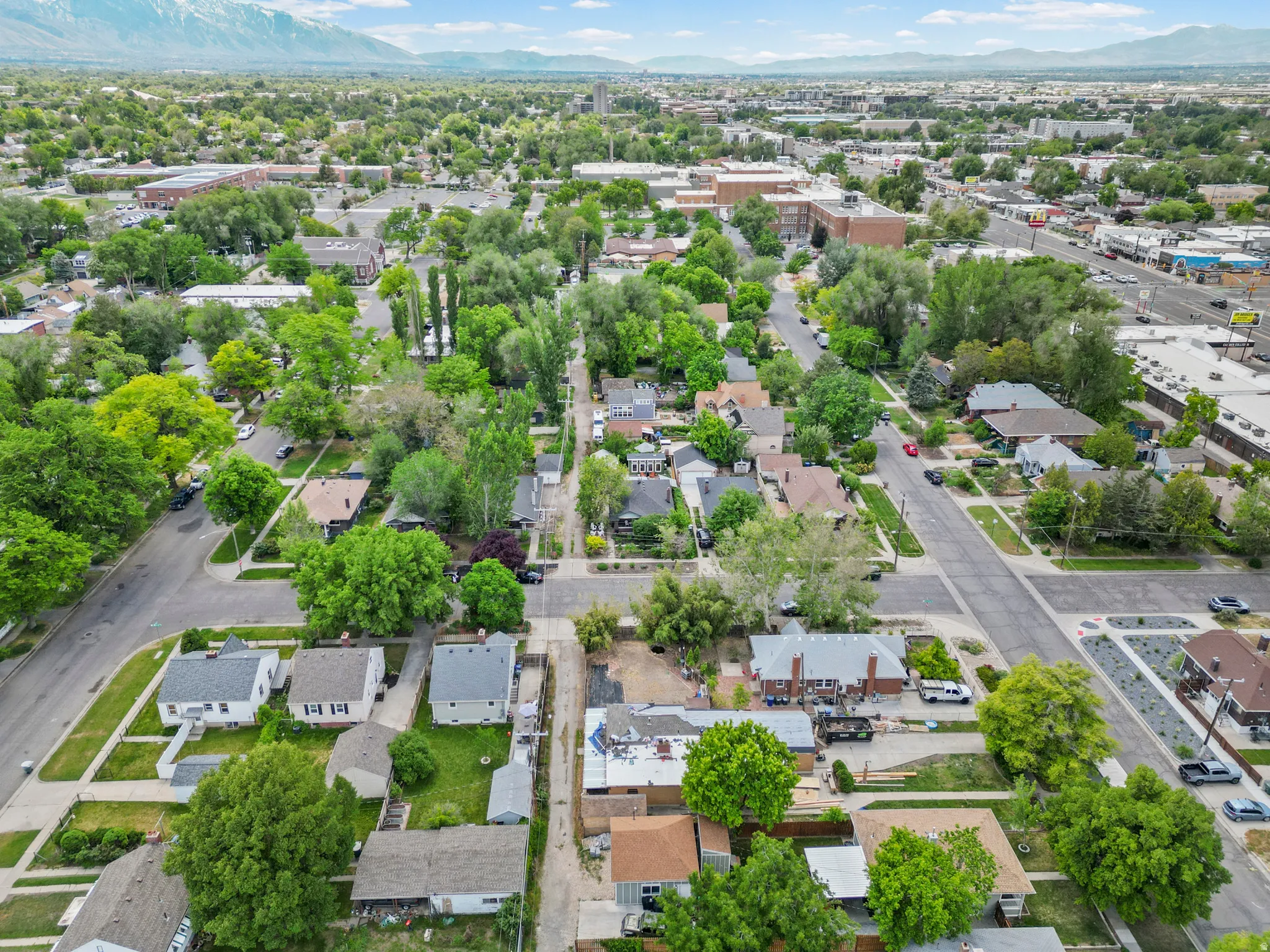 A neighborhood nestled in trees close enough to conveniences