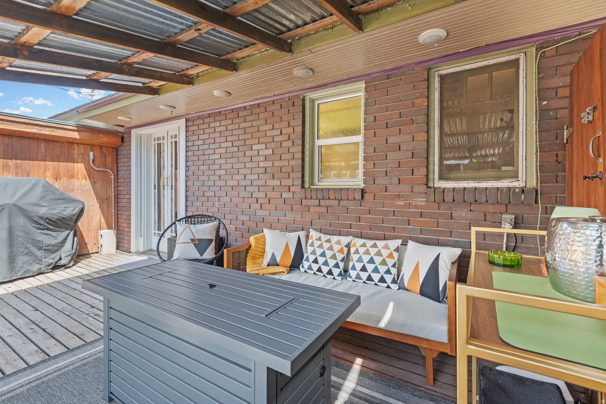 Covered patio with a lot of space for gathering and sharing