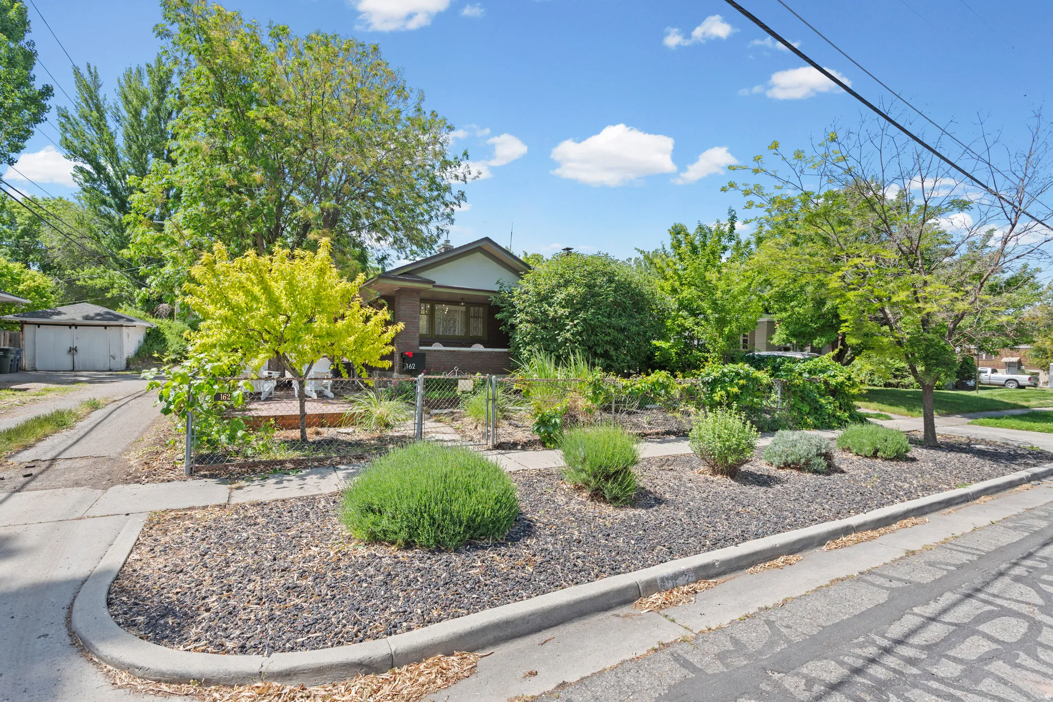 Drive on the left leads to your private driveway and garage