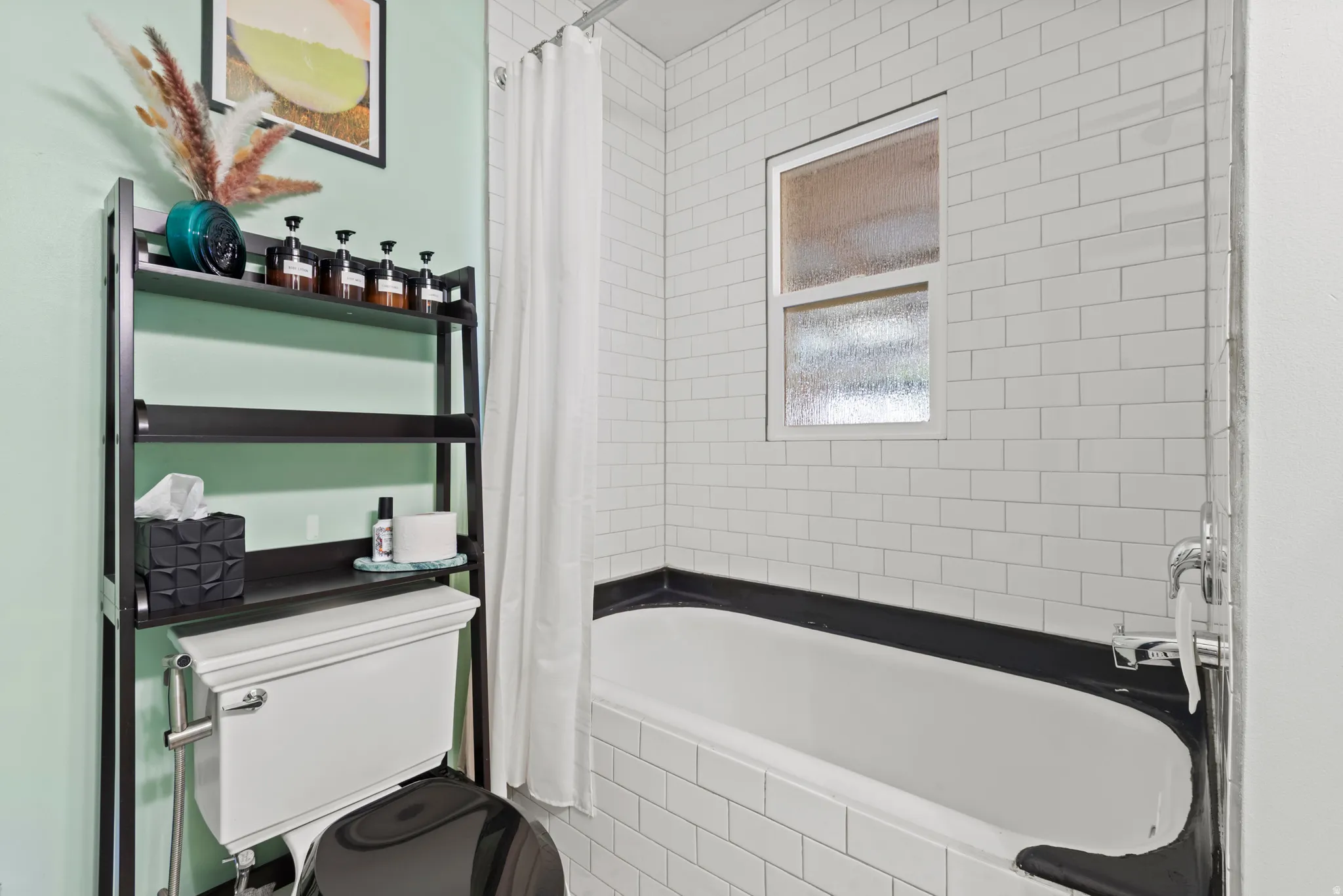 Bathroom featuring charming vintage white subway tile walls