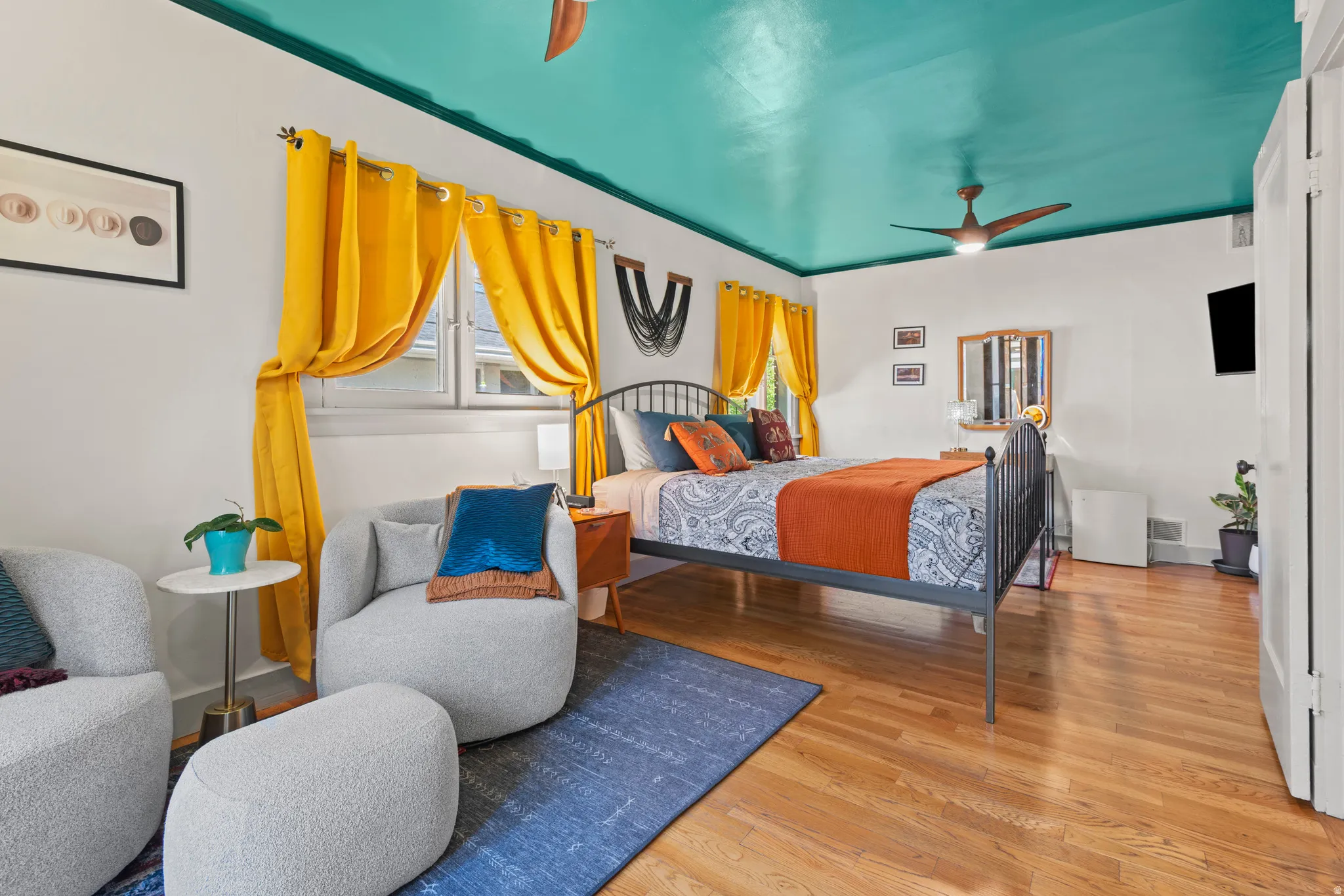 Primary bedroom with a large bed and still room to spare.