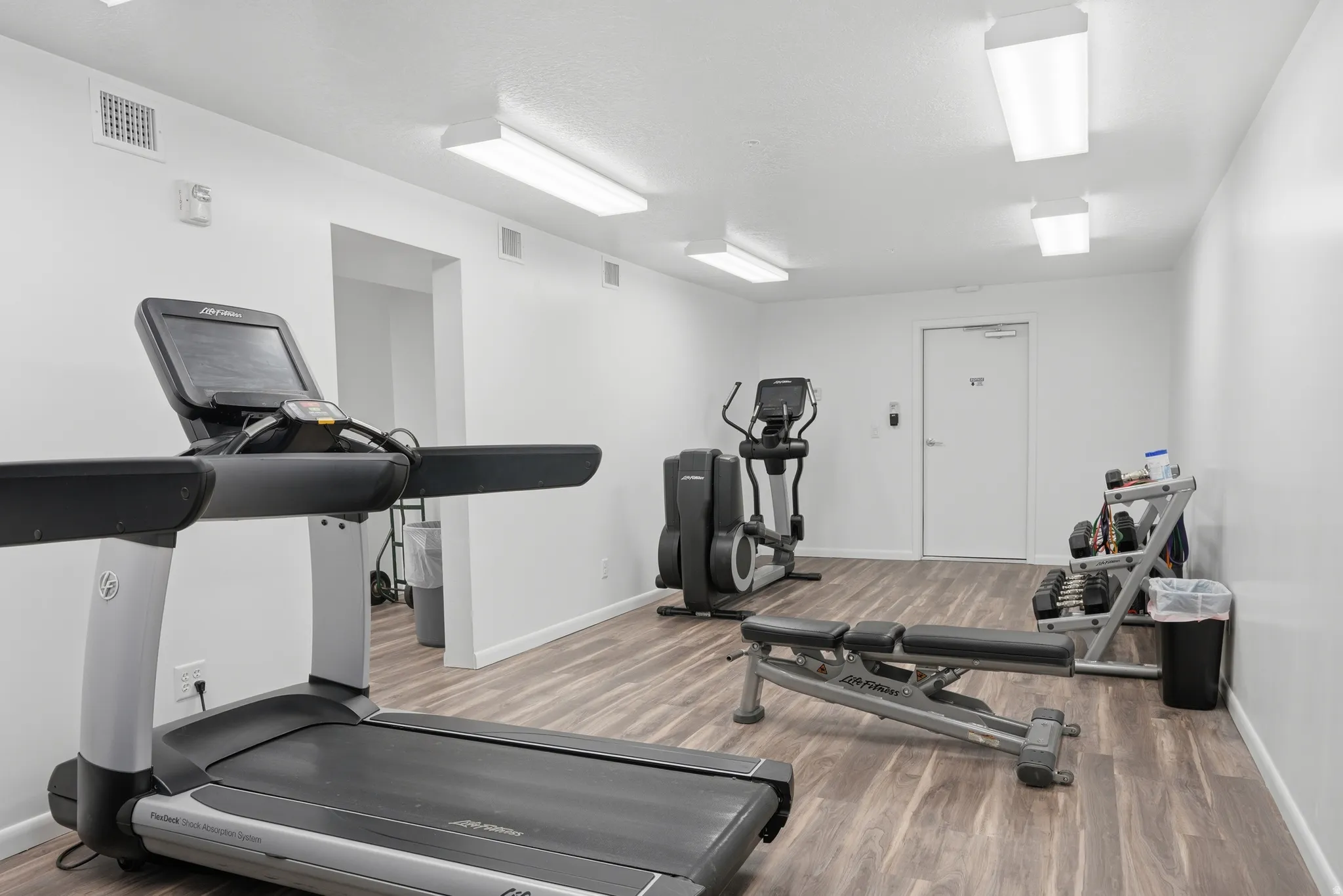 Fitness room with machines and weights
