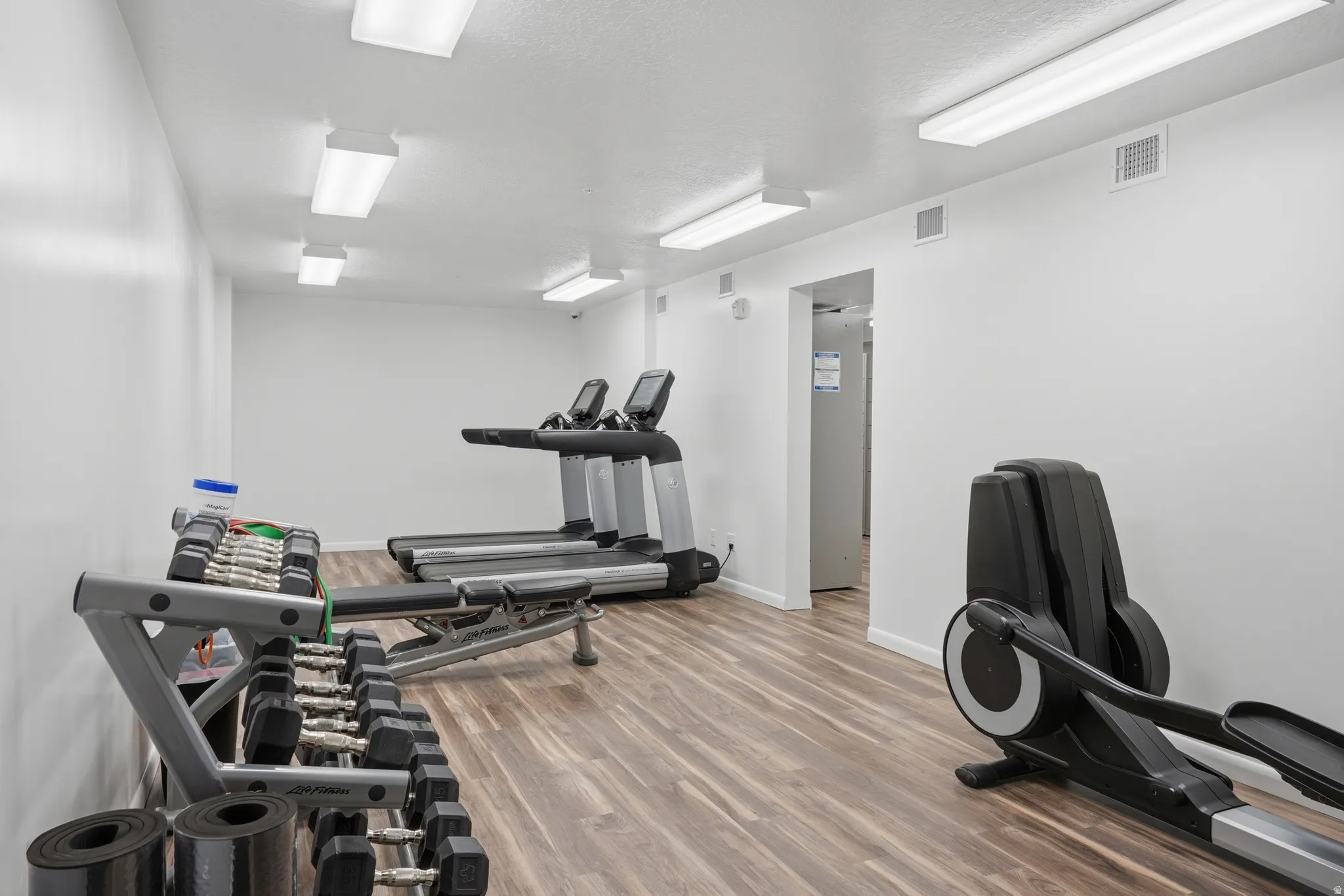 Fitness room with machines and weights