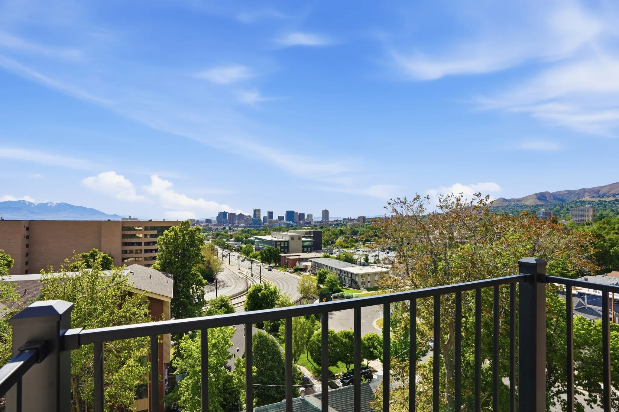 Beautiful balcony with incredible views of the city skyline and mountains
