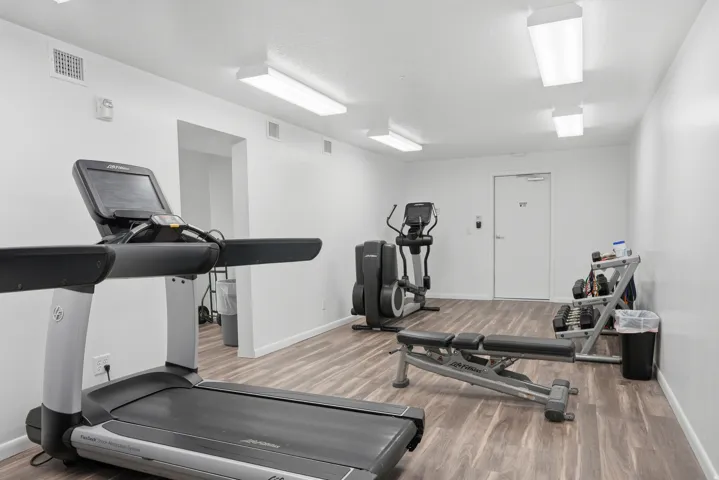 Fitness room with machines and weights
