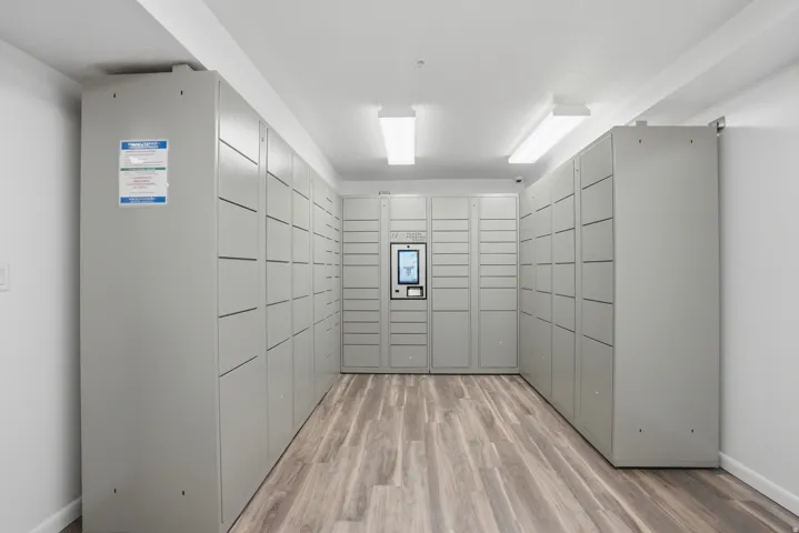 Dedicated parcel locker system featuring a central digital interface