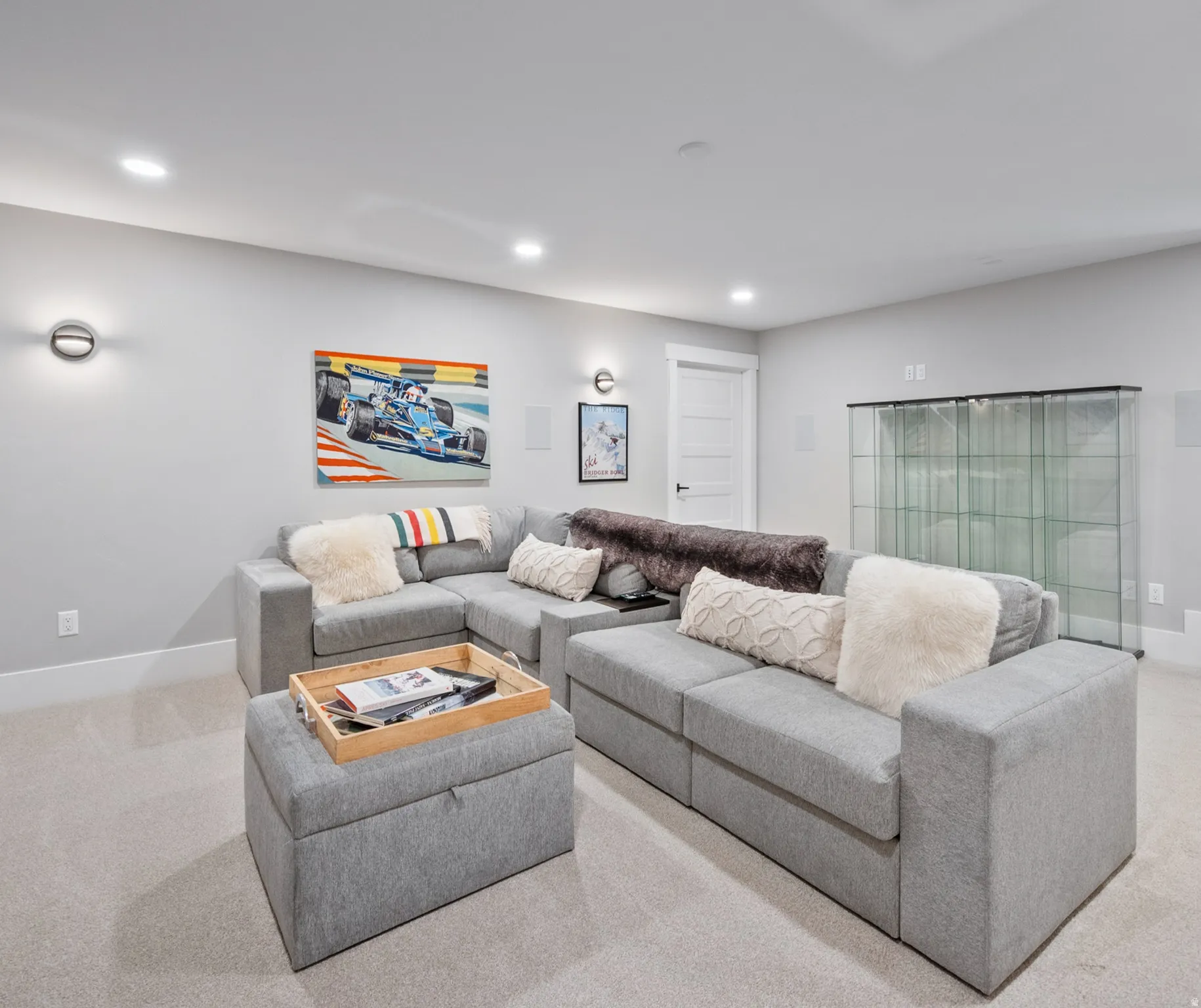 Recessed lighting illuminates the open-concept living area