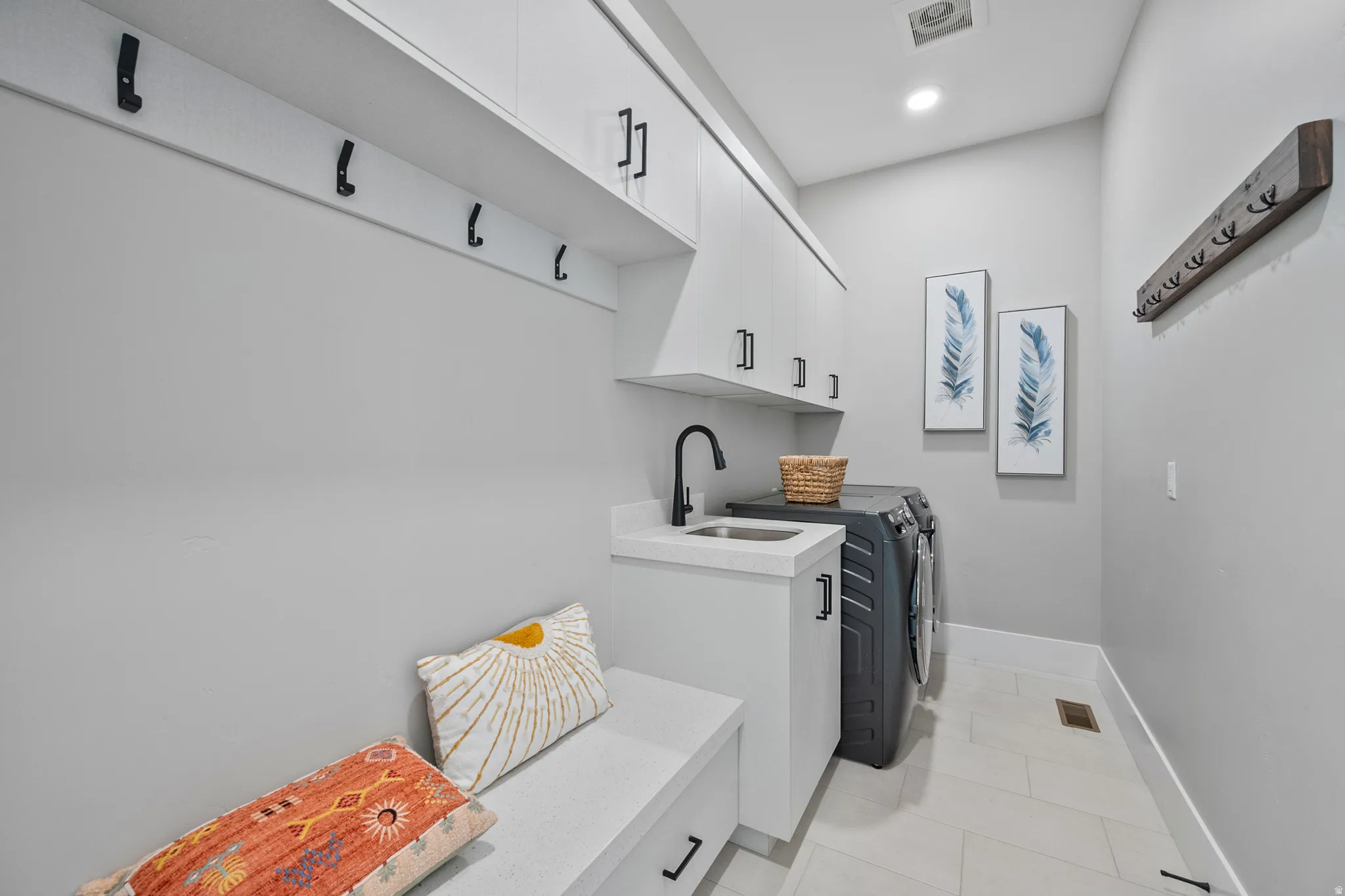 Laundry room/Mudroom with Extensive Storage