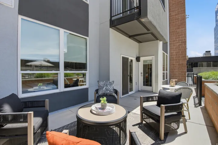 Private patio space with concrete flooring