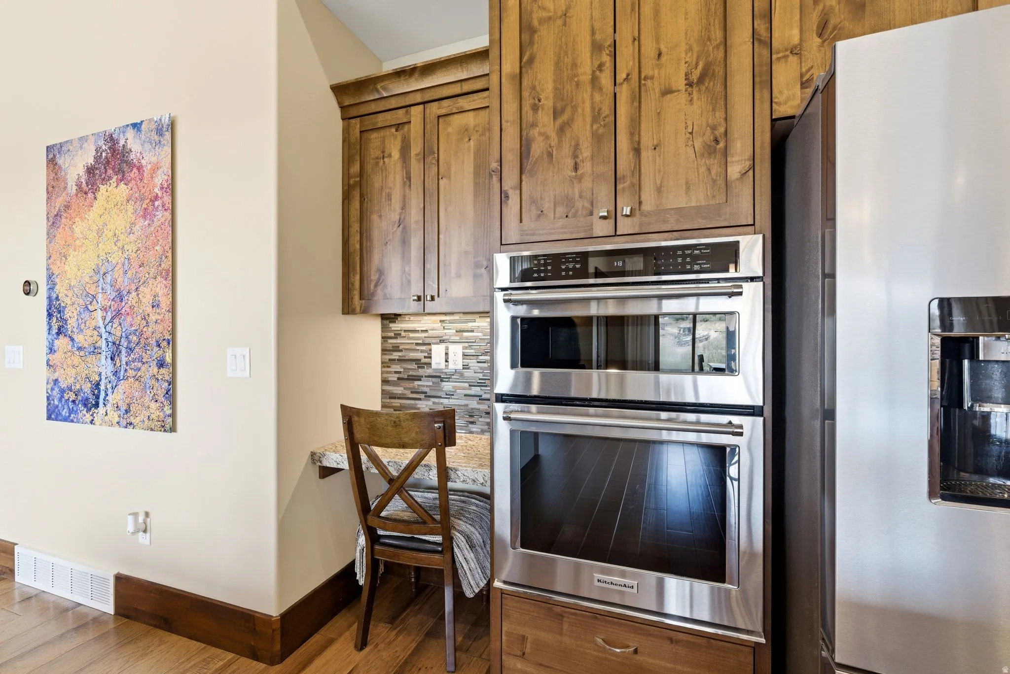 Integrated stainless steel double oven and microwave unit