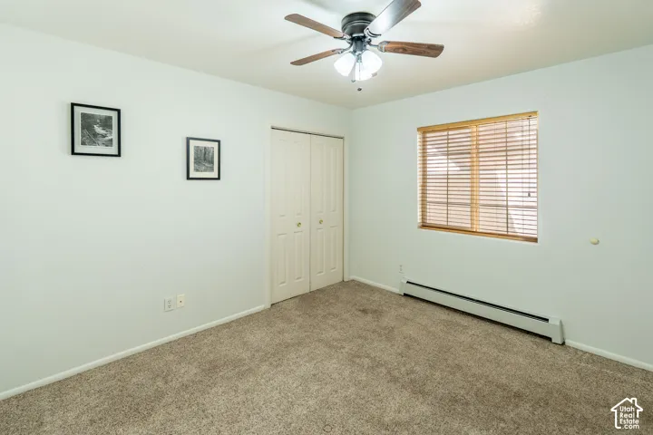 Neutral-toned carpeting paired with light walls