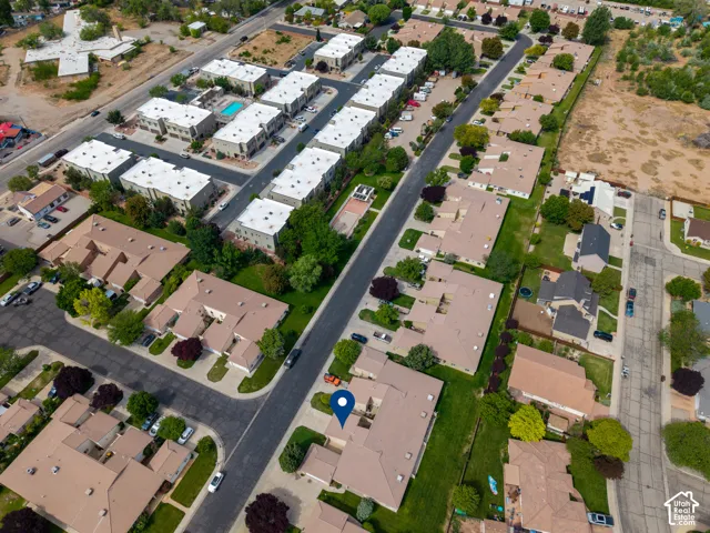 Aerial rendering showcasing a residential community with multiple detached and attached structures