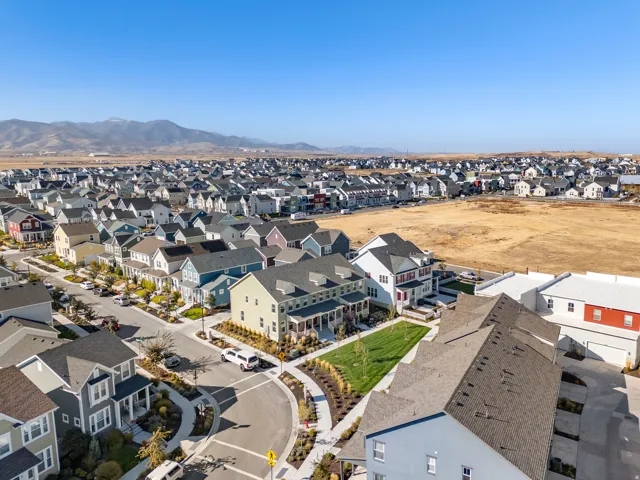 Aerial perspective showcasing a developed residential community with varied architectural styles