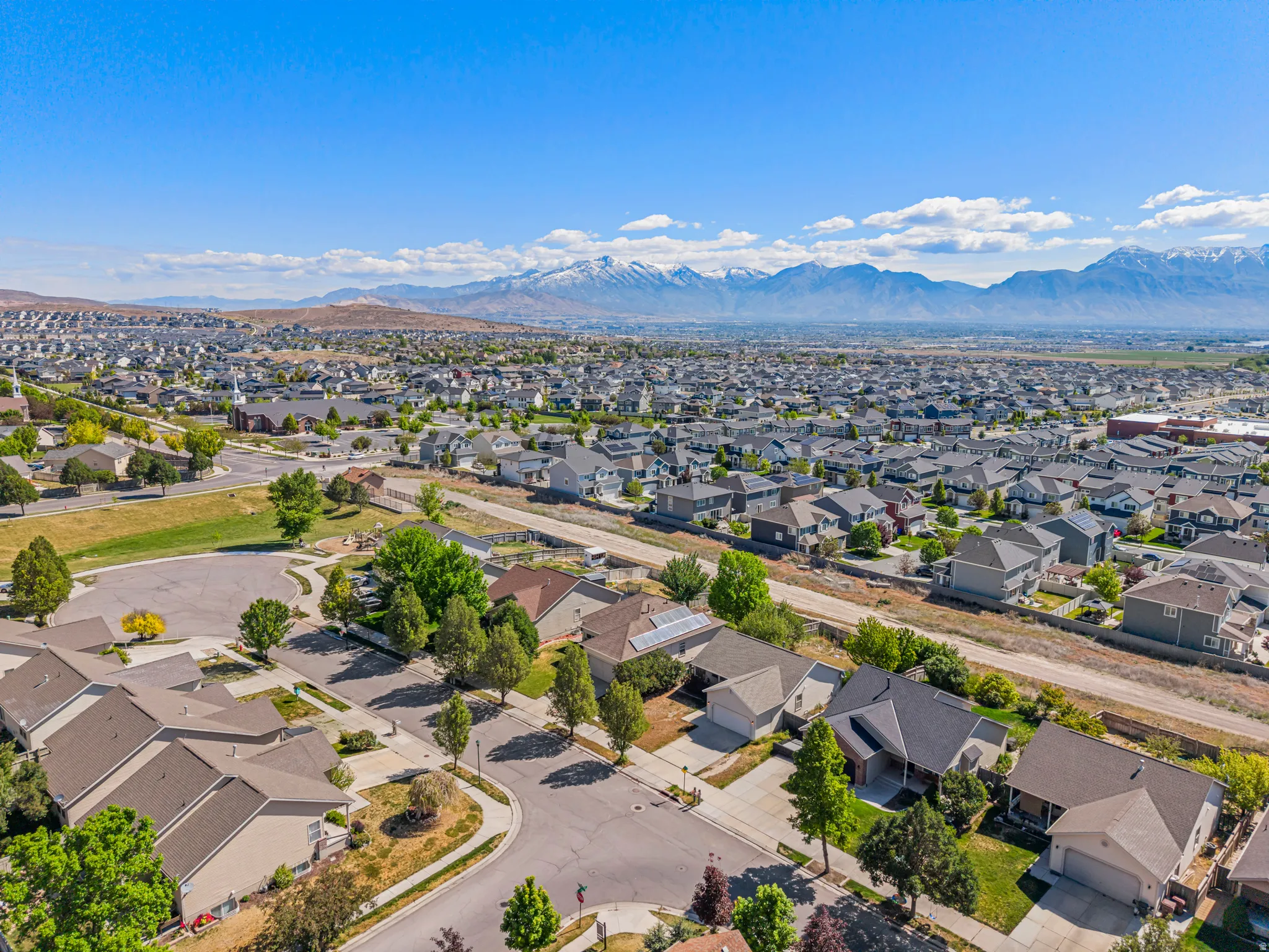 Expansive residential neighborhood with mountain backdrop