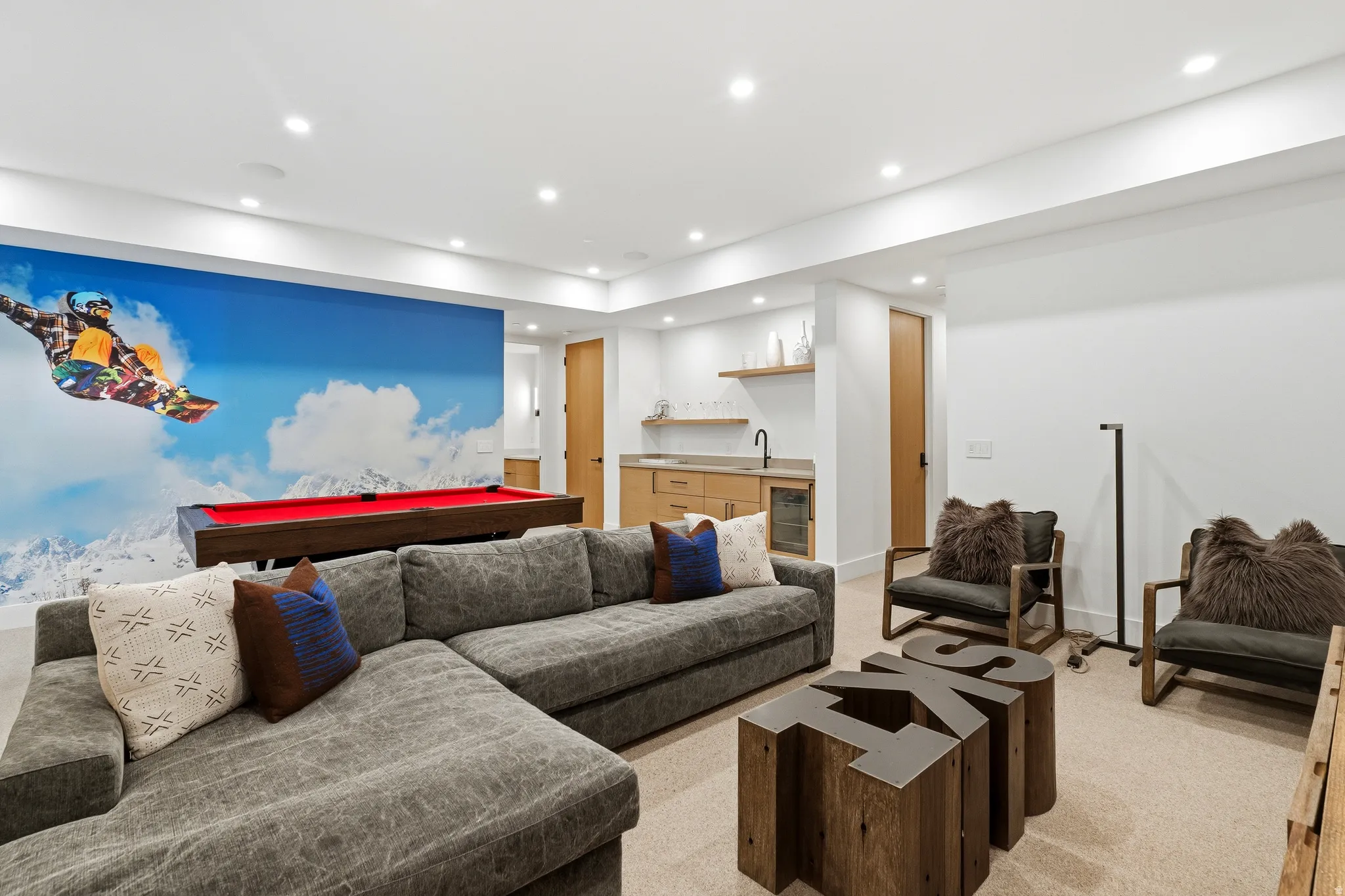 Entertainment room featuring pool table, sitting area, recessed lighting, and wet bar