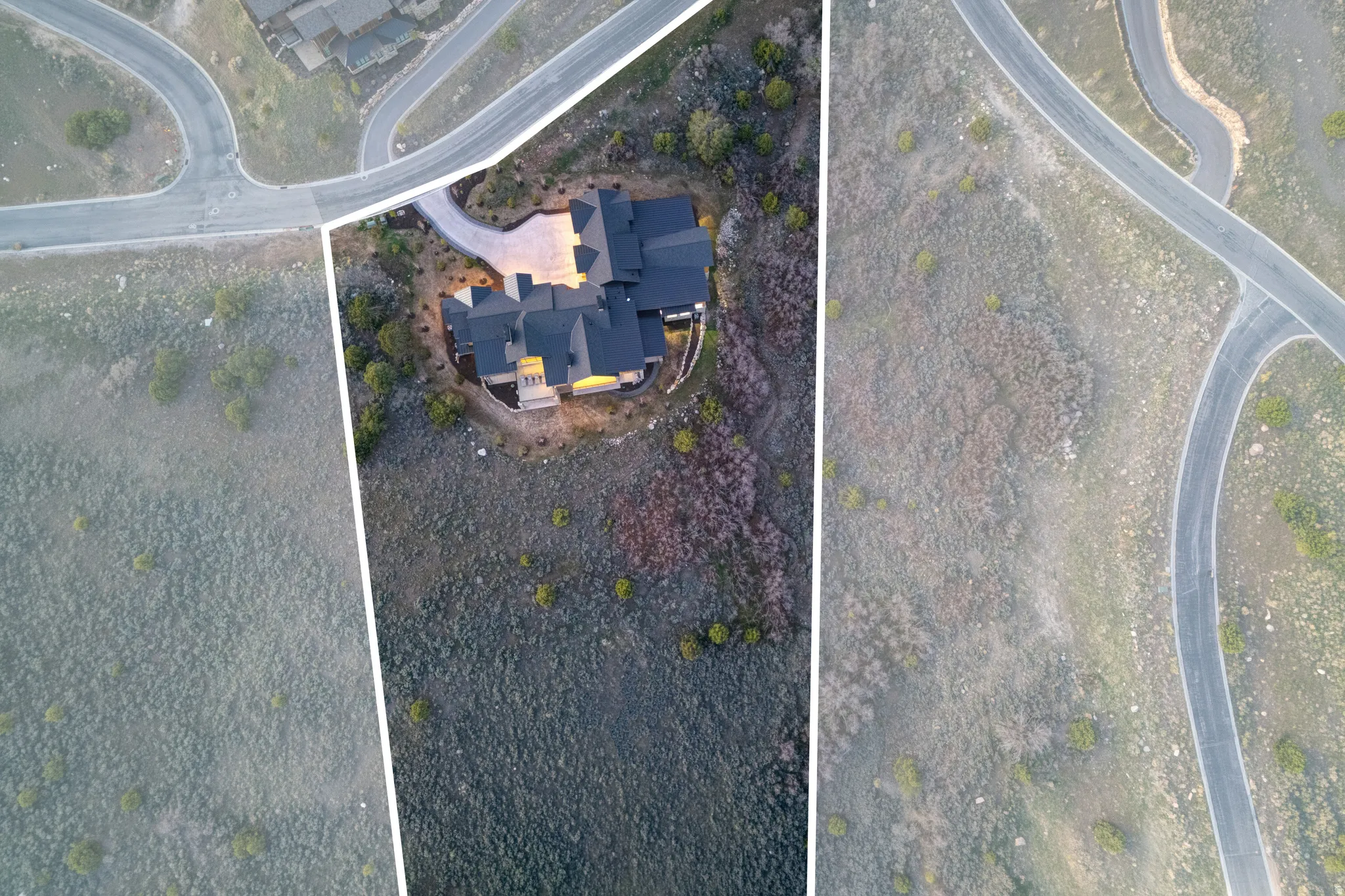 Residential property featuring a multi-level roofline, extensive paved driveway, and established surrounding foliage