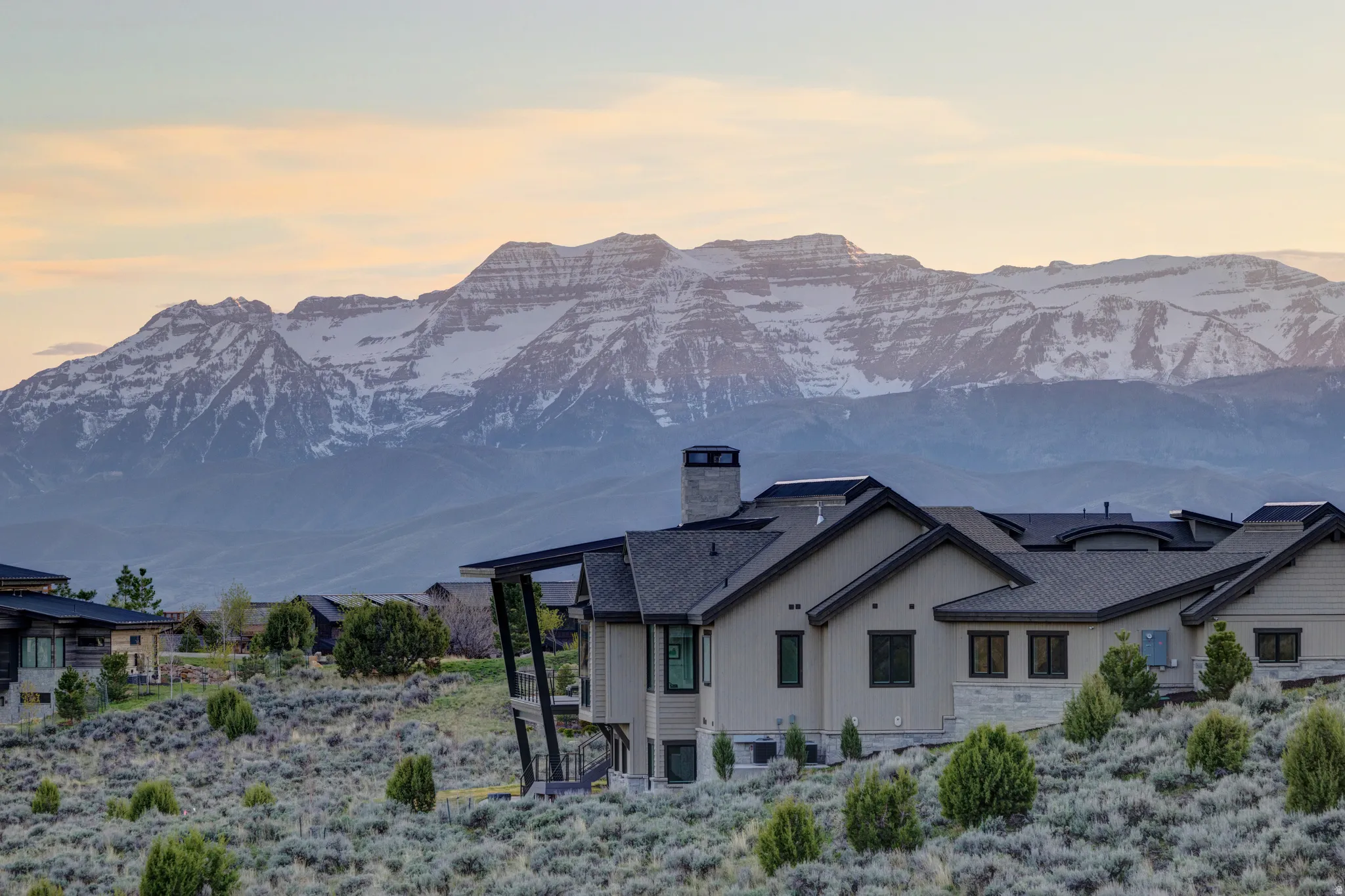 Contemporary property set against a mountain backdrop