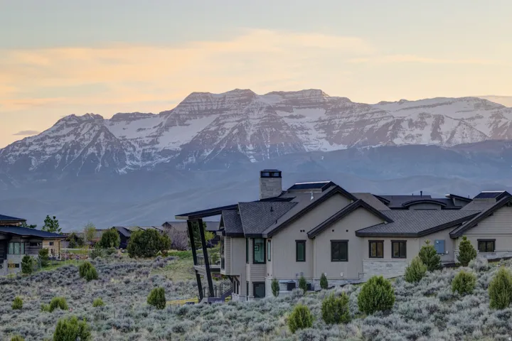 Contemporary property set against a mountain backdrop