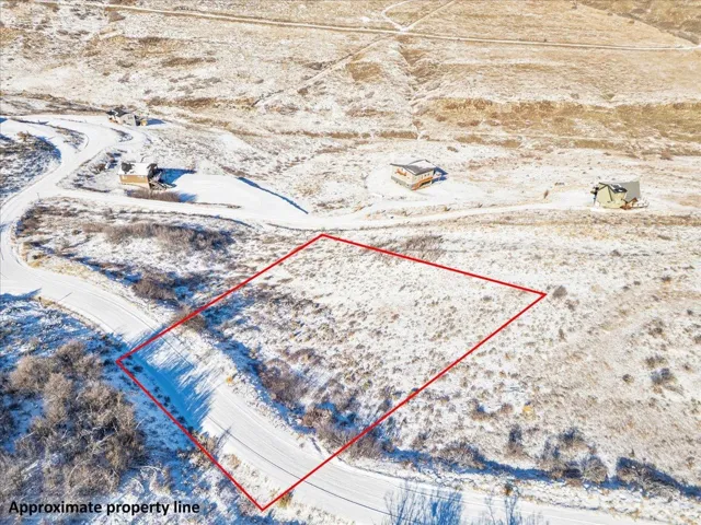 Overview of rural landscape featuring property parcel outlined