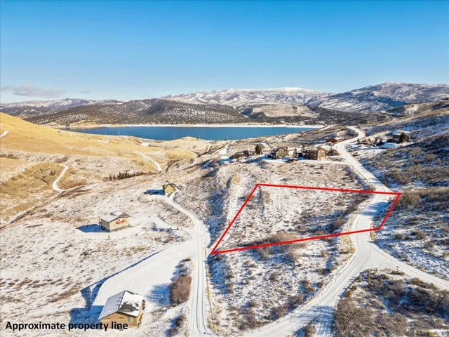View of property location with property boundaries highlighted and a water and mountain view