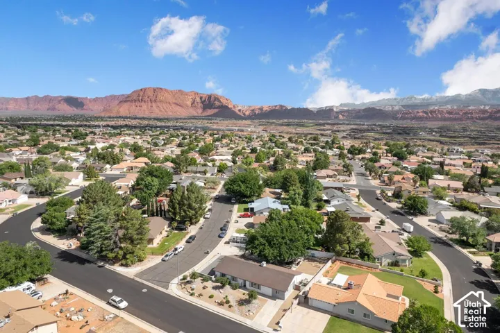 Expansive neighborhood with established residential properties and mature trees