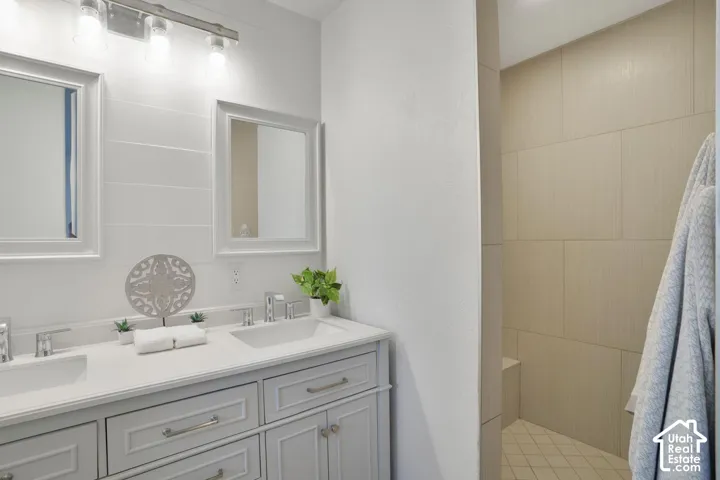 Dual vanity with integrated sinks and chrome fixtures