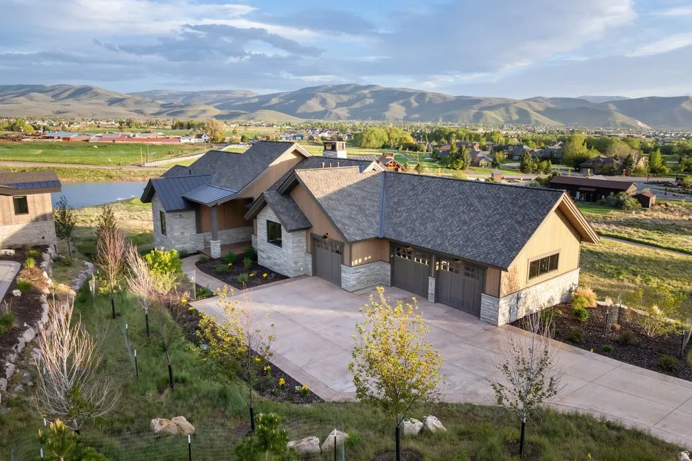 Contemporary architectural design featuring stone and wood siding