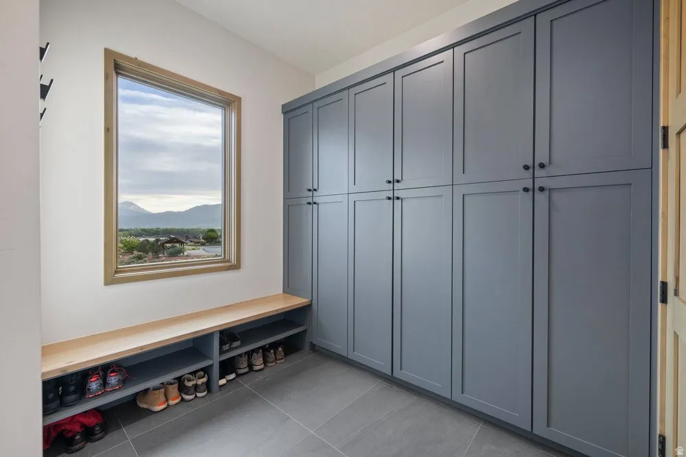 Built-in cabinetry with matte finish doors and black hardware