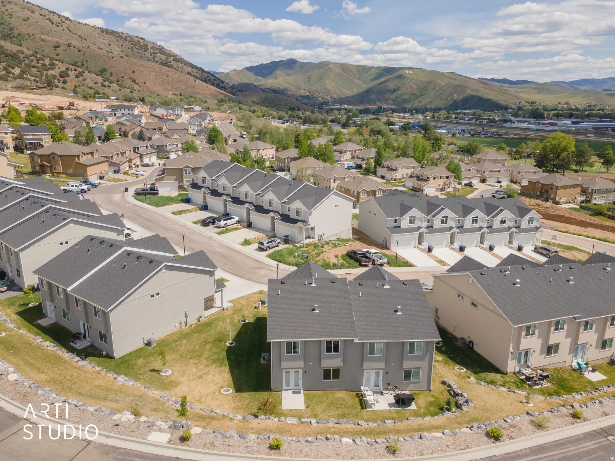 Modern residential development with a mountain backdrop