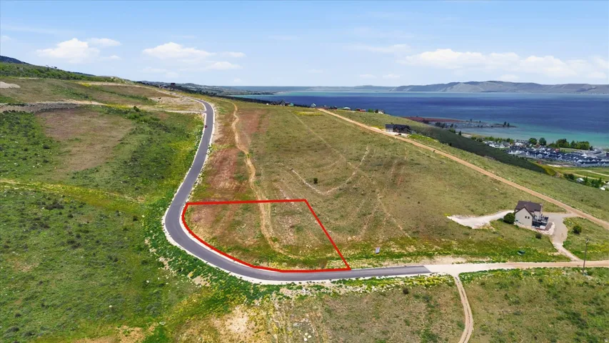 Sloping lot with paved road frontage