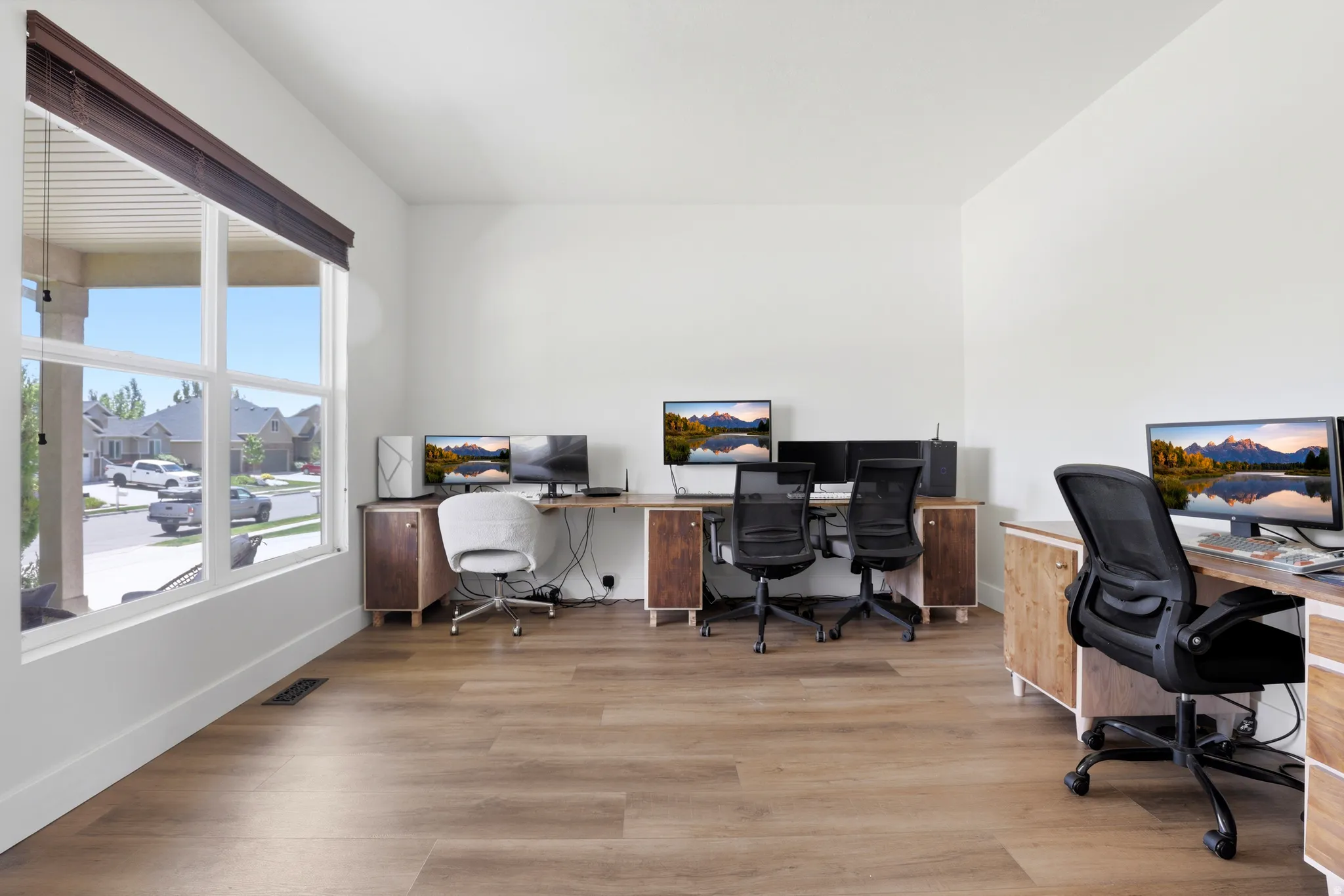 Bright interior space featuring a large window with white framing