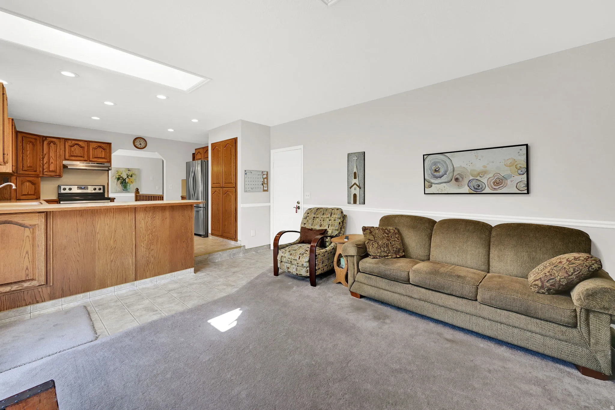 Open-concept living area with integrated kitchen