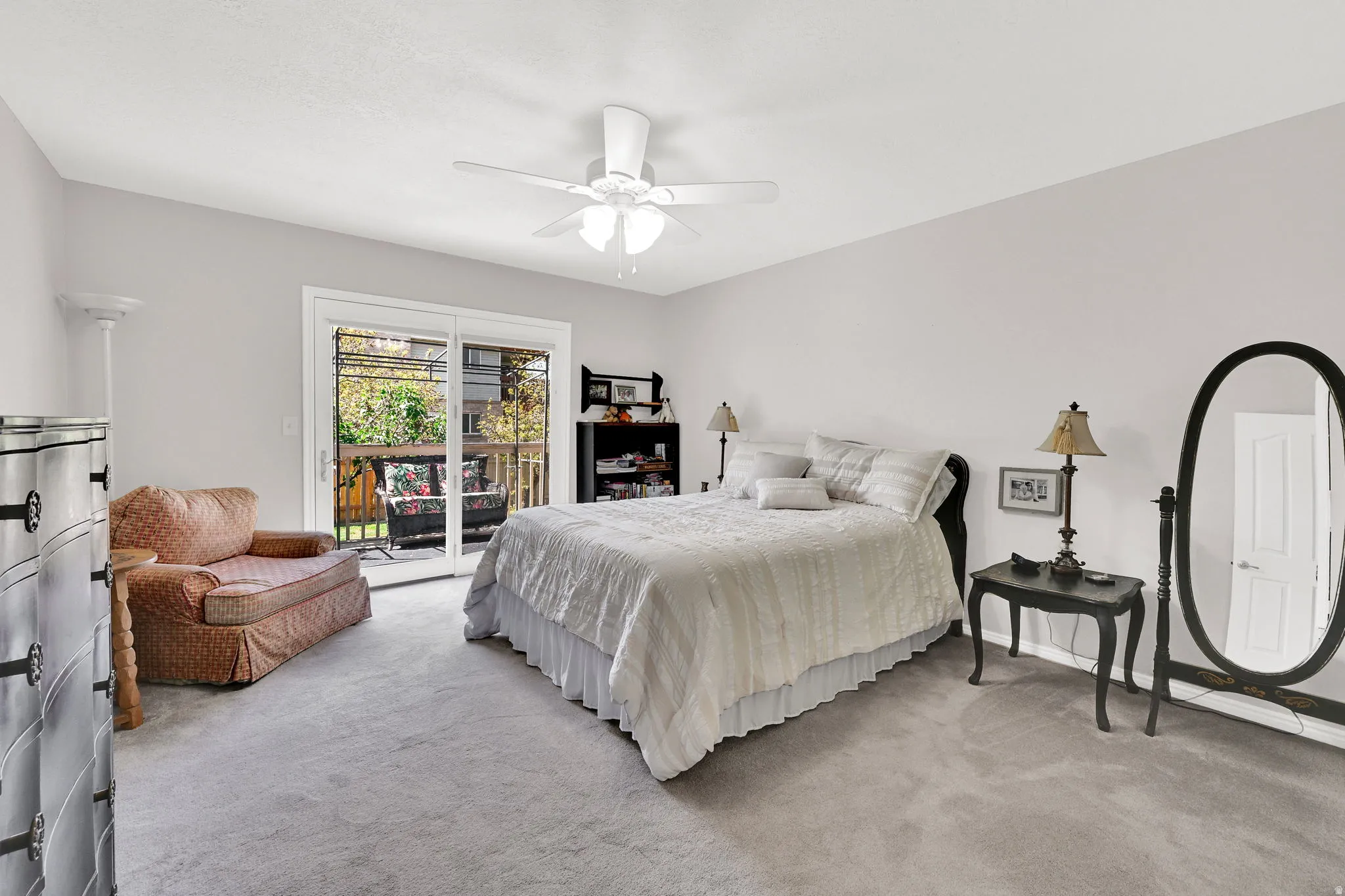 Primary Bedroom with sliding glass door access to an outdoor deck