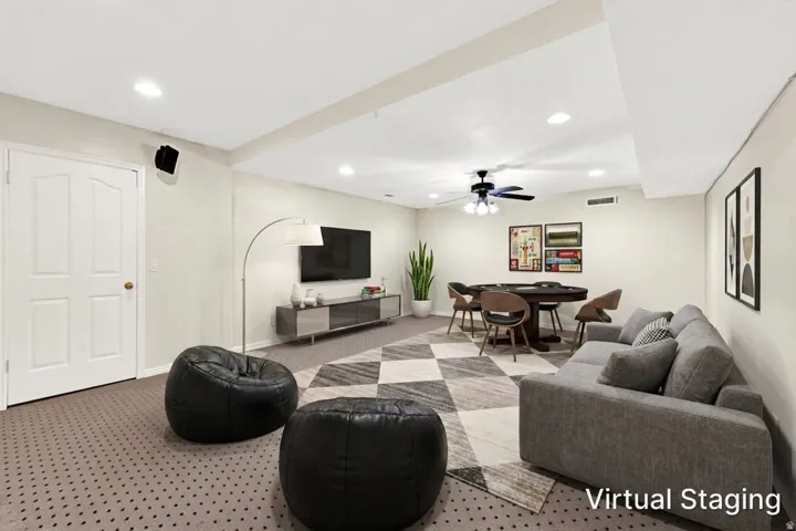 * Virtual staging to show possible use of the large flex space in basement.