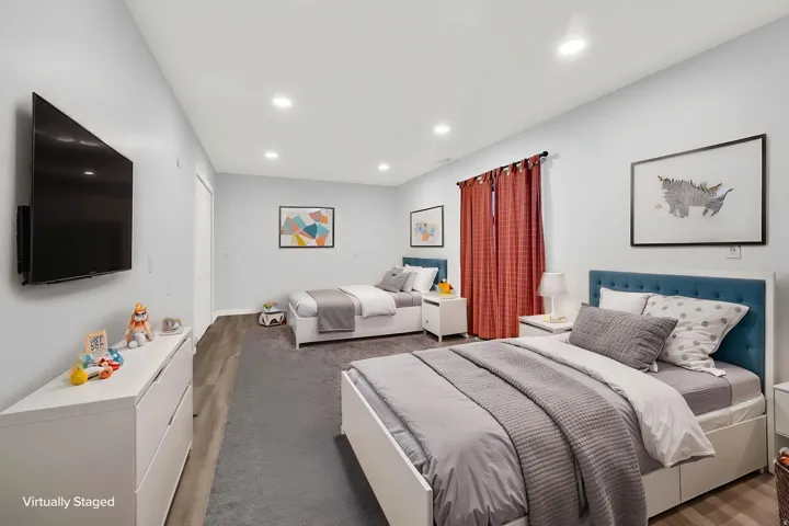 * Virtual staging to show possible use of the large basement bedroom #4.