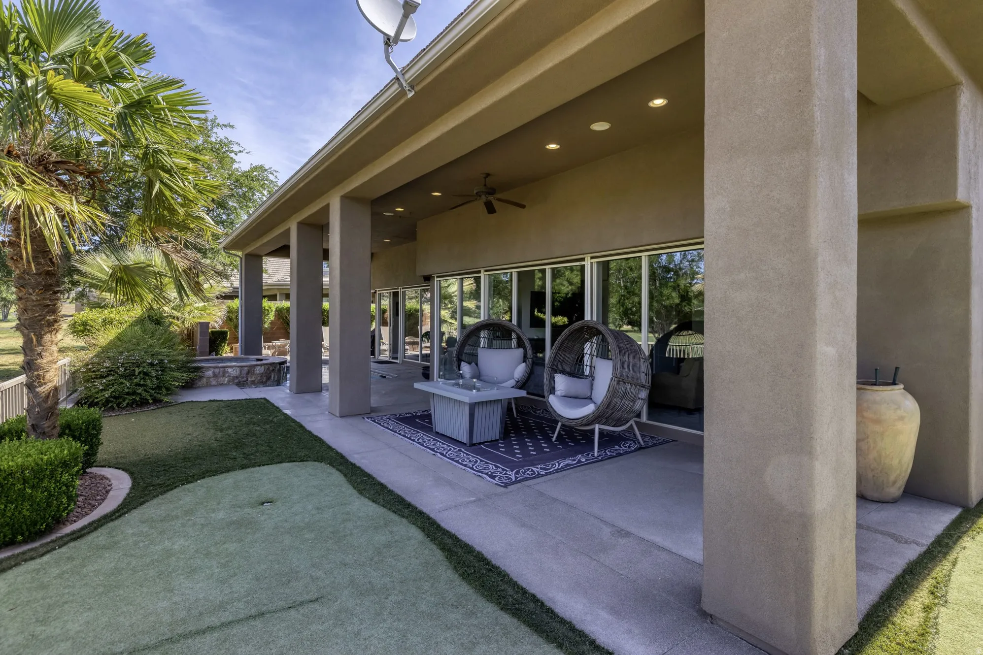 Covered patio with recessed lighting and a ceiling fan