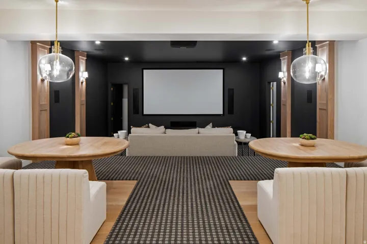 Home theater room with recessed lighting