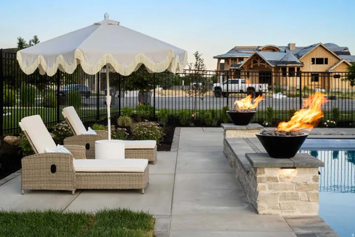 View of patio with an outdoor fire pit