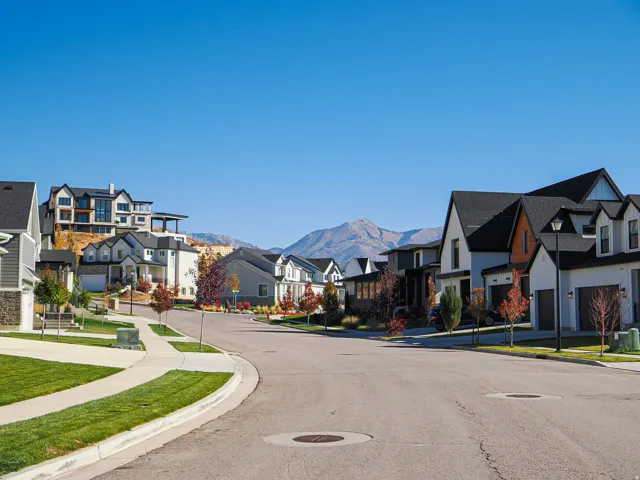 Residential street featuring a variety of modern architectural styles