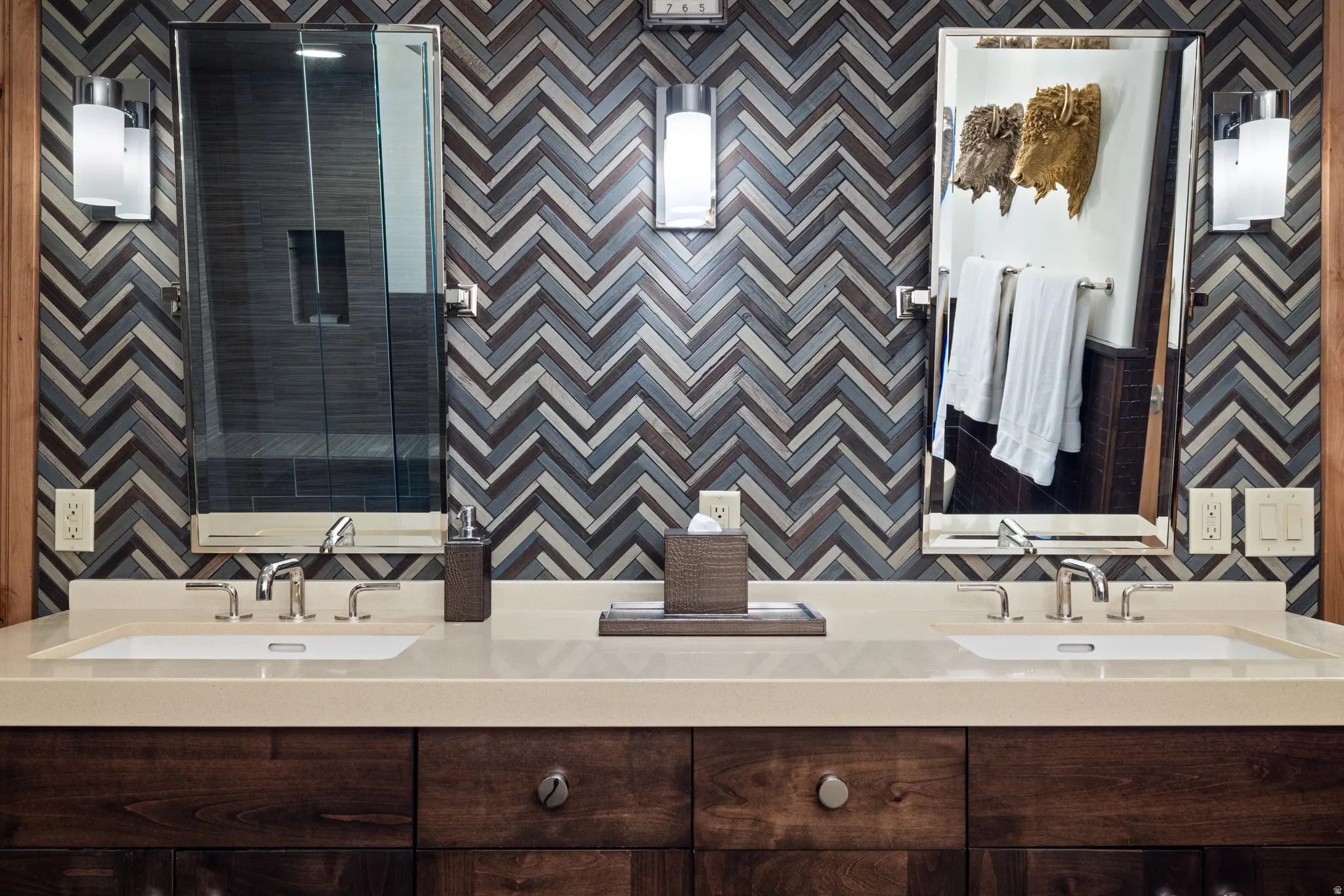 Dual vanity with undermount sinks and light-toned countertops