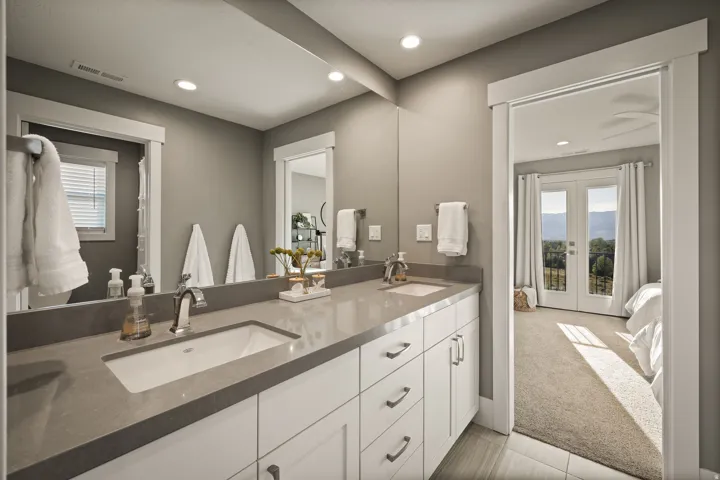 Dual vanity with under-mount sinks and a light gray countertop