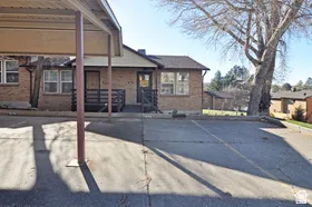Carport parking area with an asphalt surface