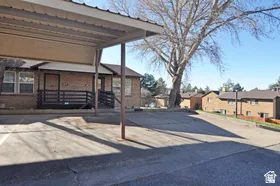 Carport parking with a paved surface