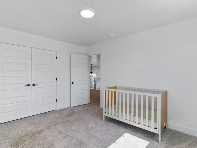 Neutral tone wall paint with white trim